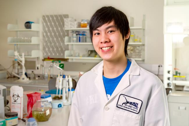 Stem student in lab coat