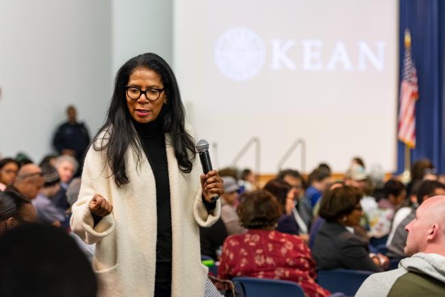 Kean Distinguished Lecture Series Judy A. Smith makes her way through the audience to take questions