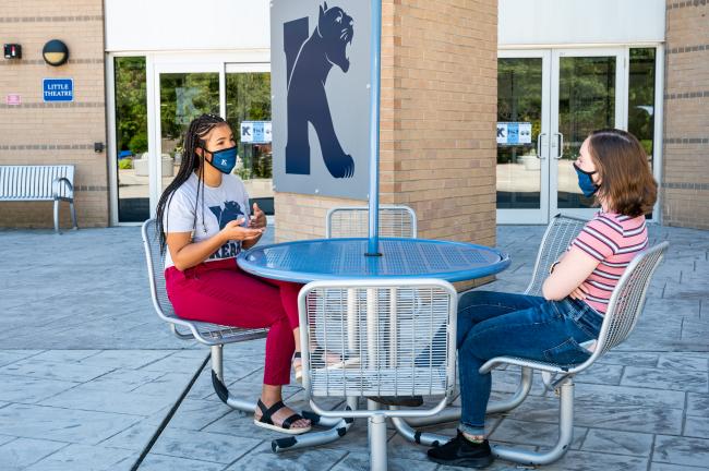 Kean students converse on the MSC patio