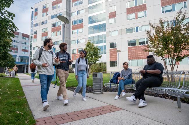 Kean students walk Cougar Walk near the Upperclassmen Residence Hall