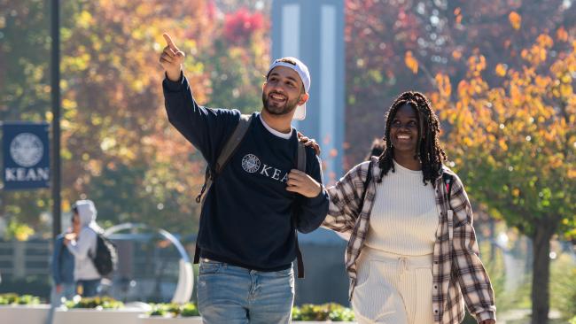 College of Liberal Arts students walk along Cougar Walk