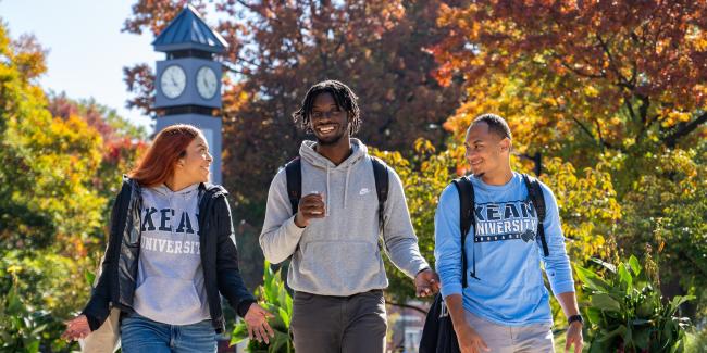Kean students walk near the clock tower
