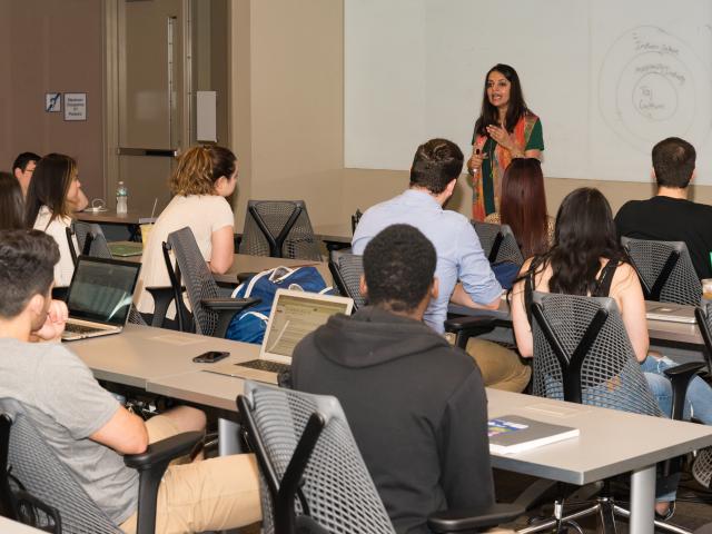 Kean management students study in a classroom. (Management Degree) 