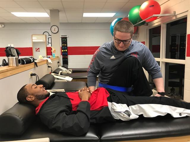 Matt Cannella '13, Athletic Trainer on the job