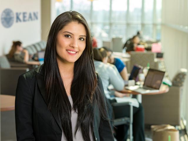 Kean Business Student in the Green Lane Building lounge