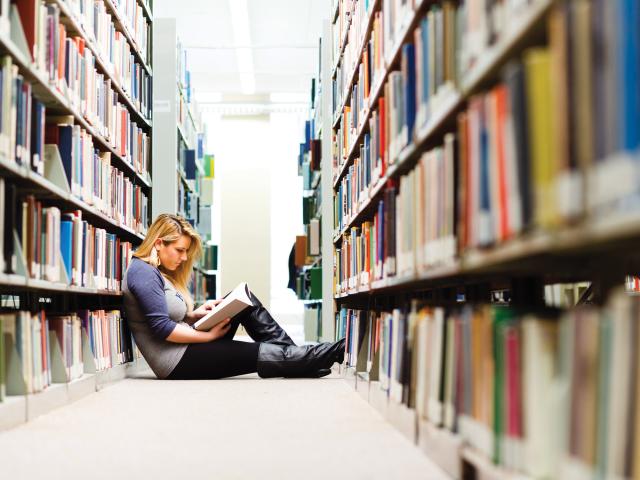 Kean University student in Library