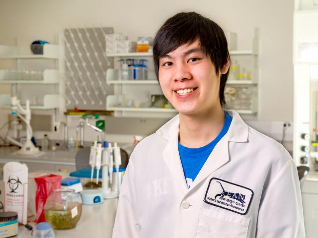 Stem student in lab coat