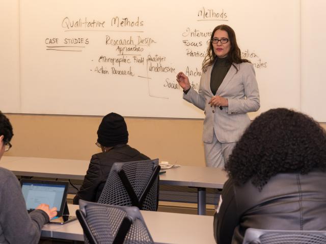 Julia Nevarez instructs Social Research class