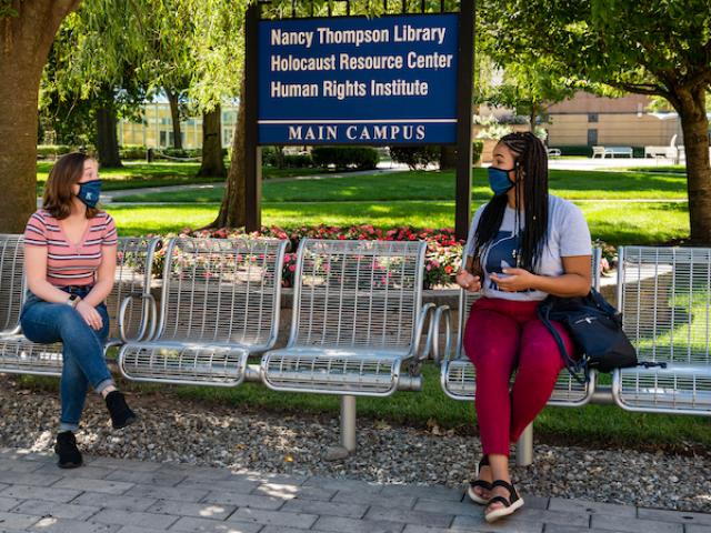 Kean students converse at a distance