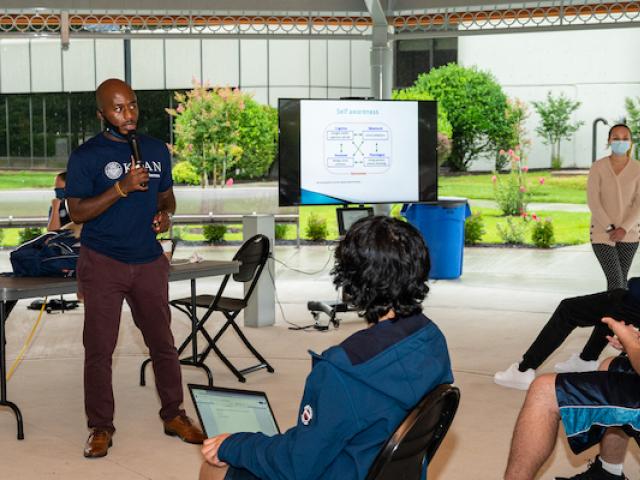 Instructor teaches outdoor class
