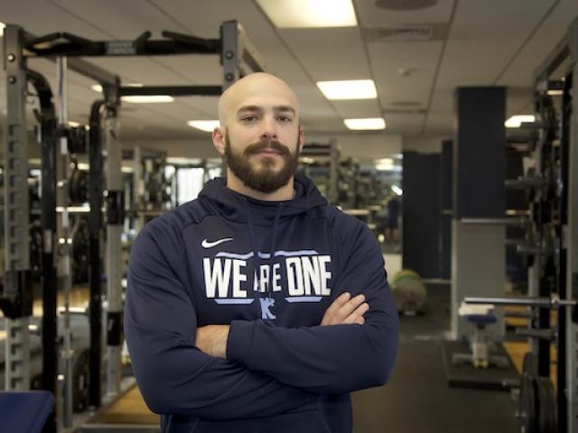 Kean student in the fitness center