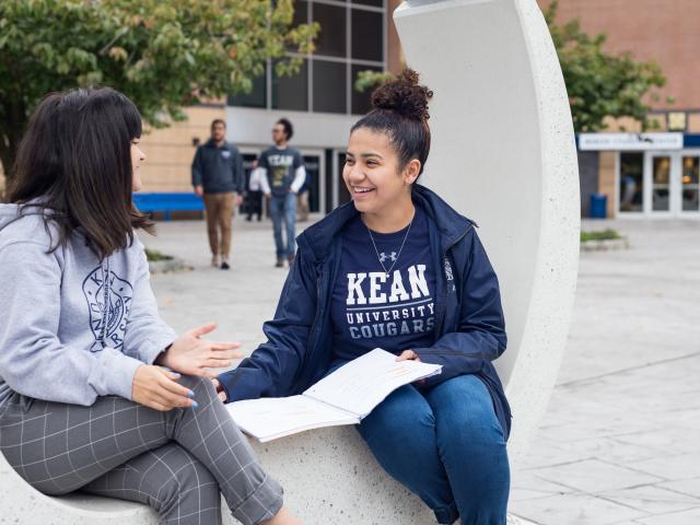 Students lounge on the MSC patio