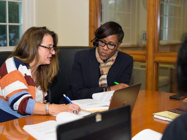 Financial aid officer working with a student