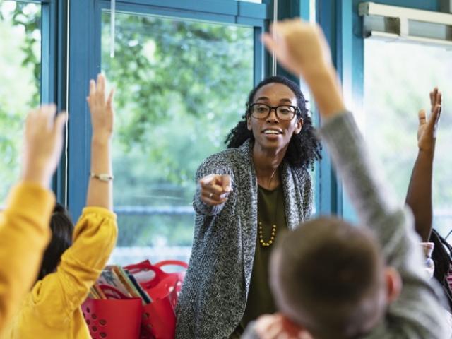 An educator asks for a show of hands