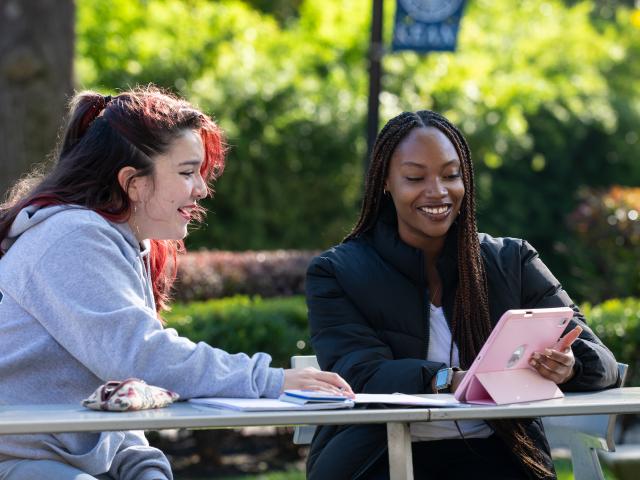 Students Looking at iPad