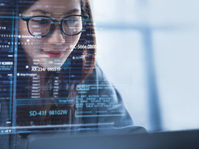 A data scientist conducts statistical analysis. 