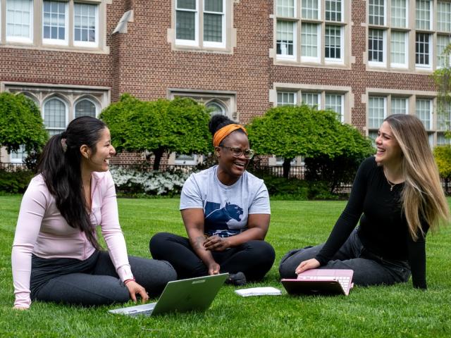 Kean Jersey City students pictured outside of Hepburn Hall 