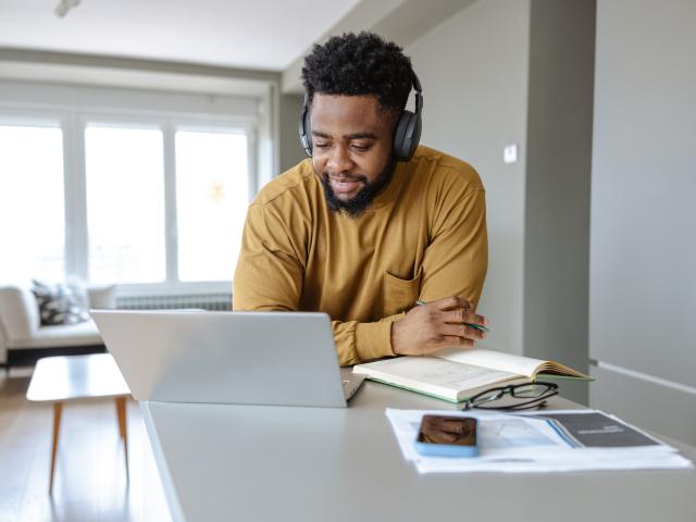 An online student takes a class at home