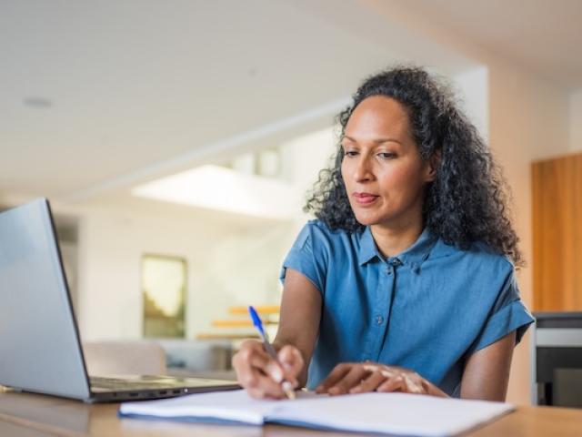 Woman working on a laptop 