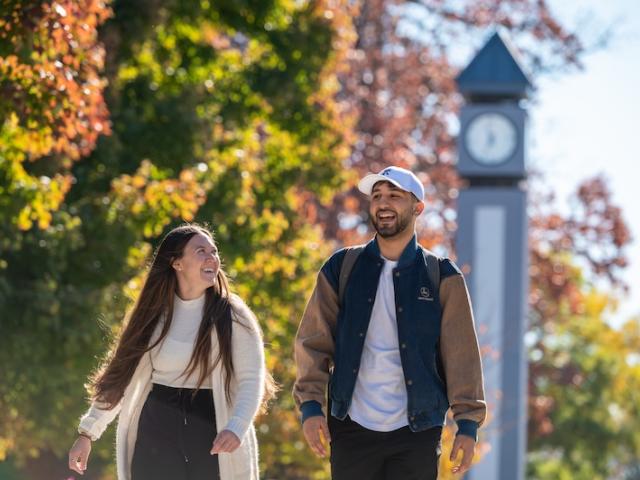 Kean students walk near the Miron Clock tower