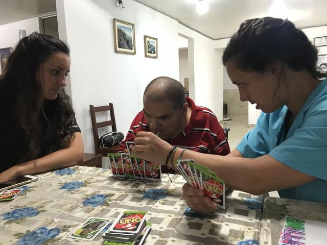 Two Kean occupational therapy students work with a client in Costa Rica.