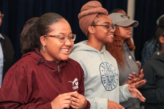 Kean Gospel Choir members rehearse for the concert that included the debut of their single.