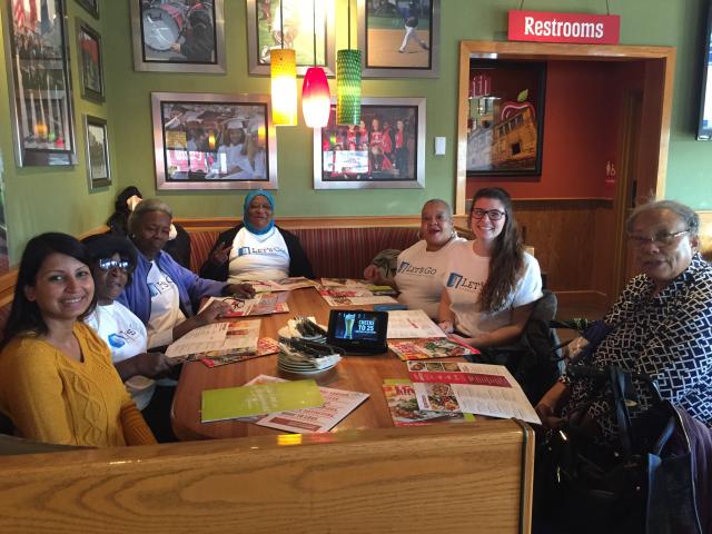 Occupational Therapy students sit at the table to have dinner with their patients.