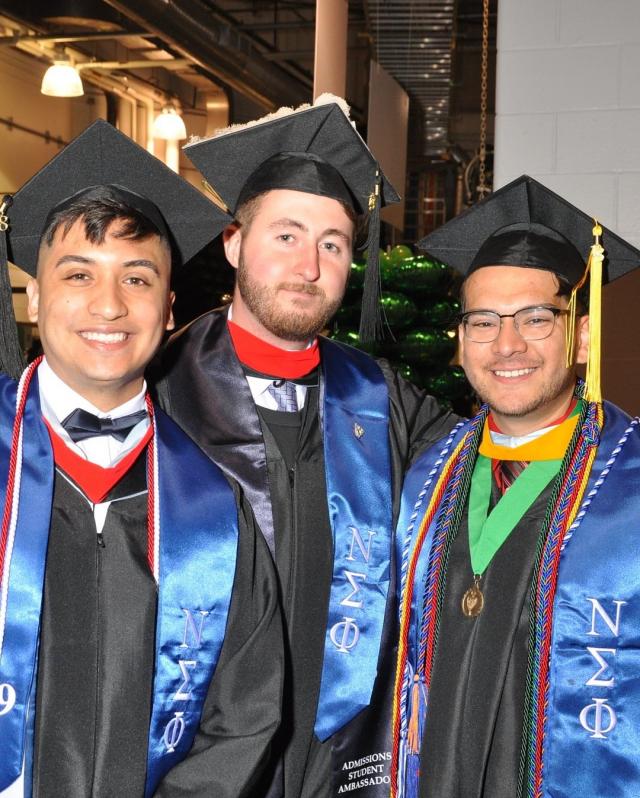 Kean students pose at their May 2018 commencement.