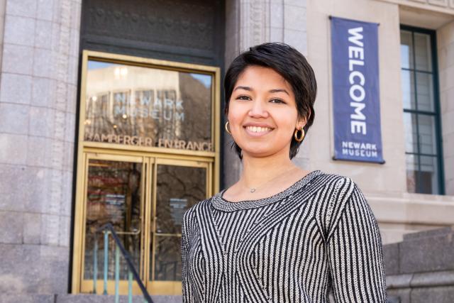 Jennifer Zuniga, Kean art history student, smiles in front of the Newark Museum