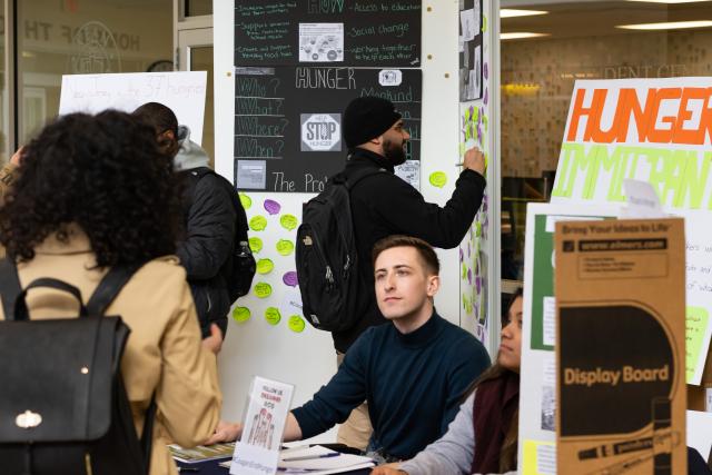 Students all gather together to participate in the hunger wall at Kean.