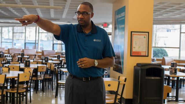 In the MSC Food Court, Kerrin Lyles points out where the new Asian food station will be