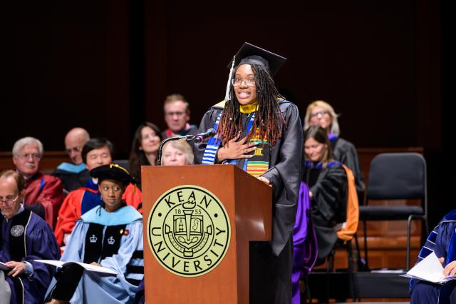 Student of Distinction Nasya Hammond-Watson speaks at the Nathan Weiss Graduate Commencement