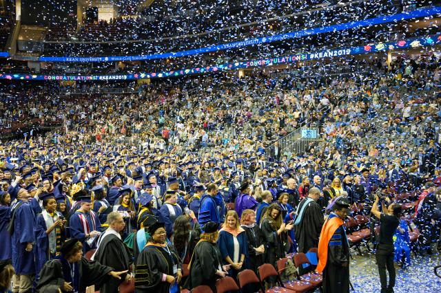 Confetti fills Prudential Center at the close of the Undergraduate Commencement ceremony.