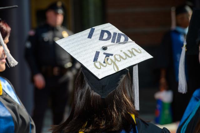 The cap of a graduating Kean University graduate student with the words, "I did it again."