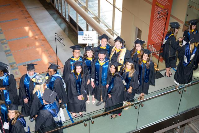 Kean graduate students line up before the commencement procession begins.