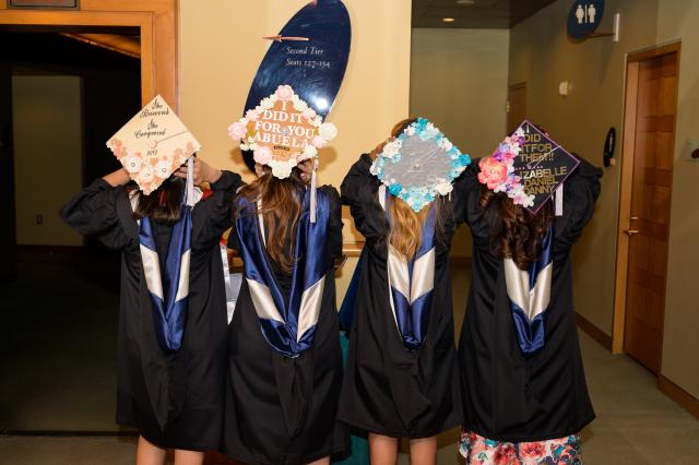 Many students had special messages to their families on their caps.