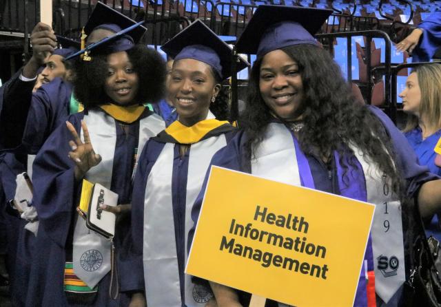 Photo of Health Information Management students about to graduate