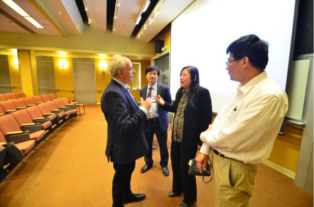 CNAHS photo of speaker speaking with faculty