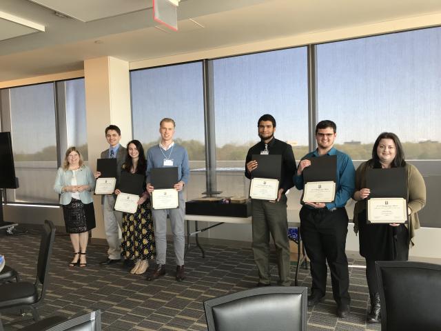 The six Kean University students who received top honors at the HERA conference pose together.