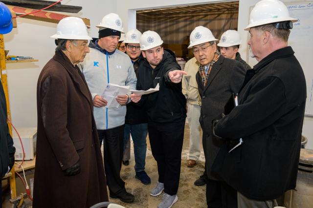 President Farahi and other Administrators touring new Hynes Building
