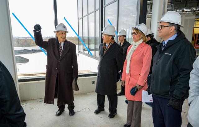 Discussion during tour of Hynes Hall construction