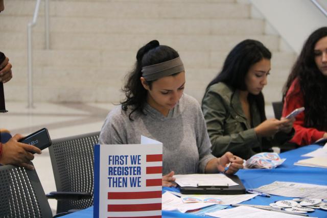 Voter registration tabeling sign