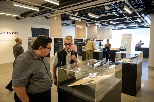 Guests Looking At Collection Material in Liberty Hall Academic Center Gallery