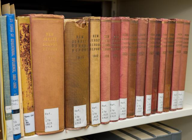 This is an image of a shelf full of books In The Special Collections Library