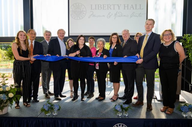 Group image of students and leadership at the ribbon cutting ceremony for Liberty Hall Academic Center