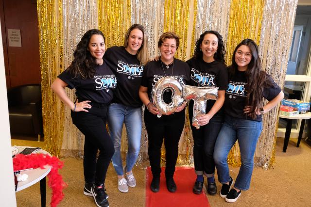 Kean University's Occupational Therapy Students pose for a picture during the Student Occupational Therapy Association's (SOTA) Older Adult Prom.