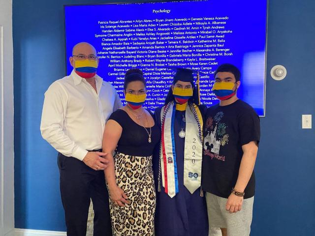 kean grad 2020 family celebrates in masks