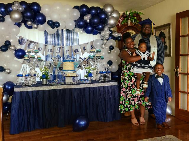 Kean 2020 graduate Edwin Smiley and his family celebrate his commencement.