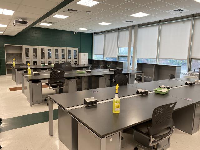 Photo of Science Lab with disinfectant bottles on the lab tables