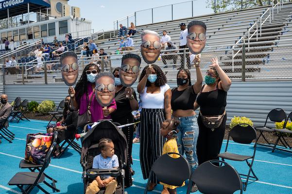 Family with face signs